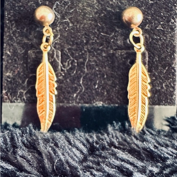 Jewelry - Gold Feather elegant Drop Earrings posts